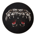 A circular black vinyl record or disc featuring a detailed graphic of two roaring tigers facing each other, with white stripes, black outlines, and bright red interiors, centered on a plain white background.